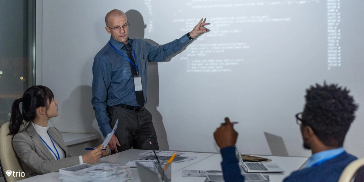 employee giving a training to coworkers