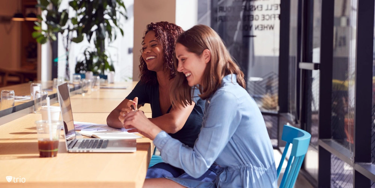 Female employee has a buddy employee to help