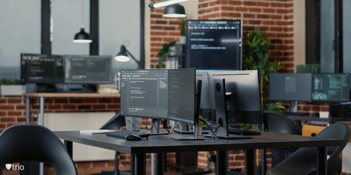 Image of various computers and laptops in an office