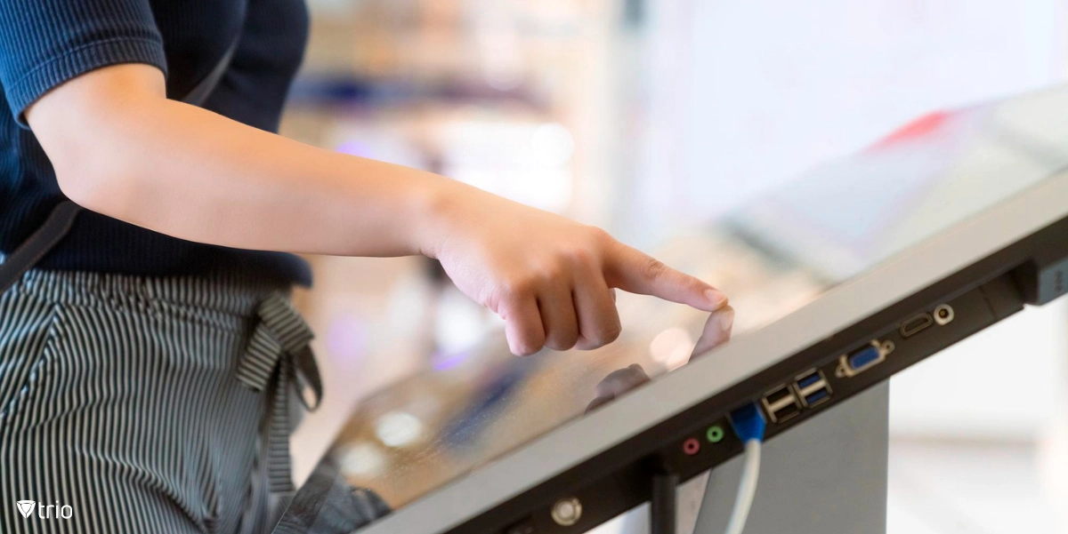 Woman choosing from options on a Kiosk