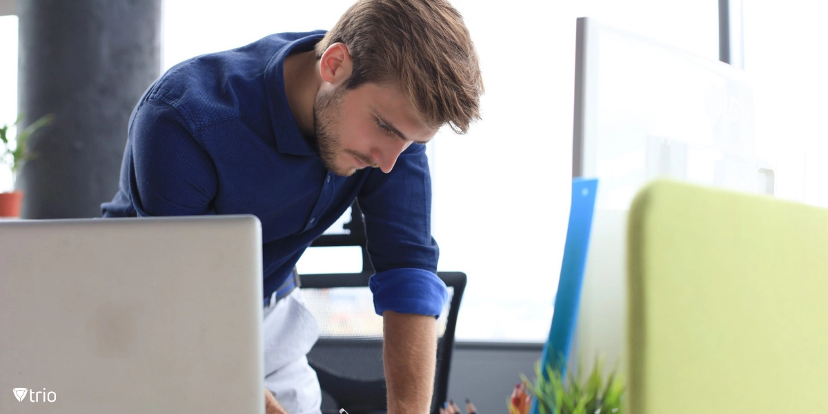 Man working with office computer using kiosk software