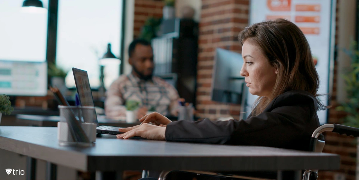 Employee working with laptop in office