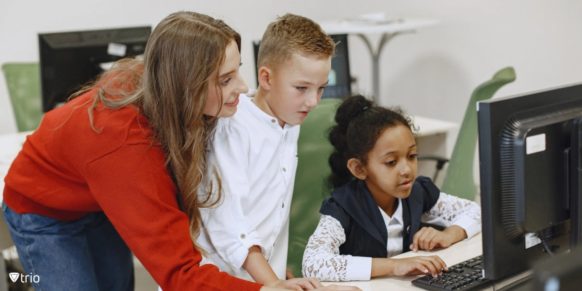 A teacher teaching her students about online safety