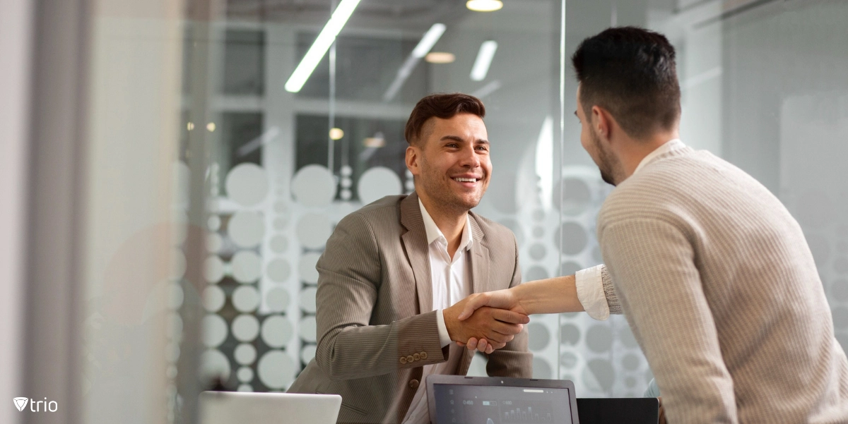 Retailer employee engaging with customer