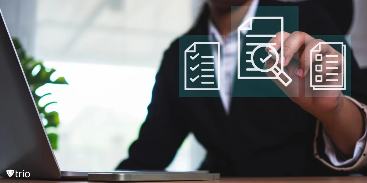 A professional in a suit interacting with a digital interface. The person is using a touchscreen or virtual screen with floating document icons, checklists, and a magnifying glass symbol