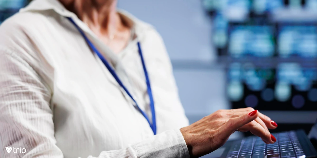 IT admin using laptop to maintain J-SOX compliance