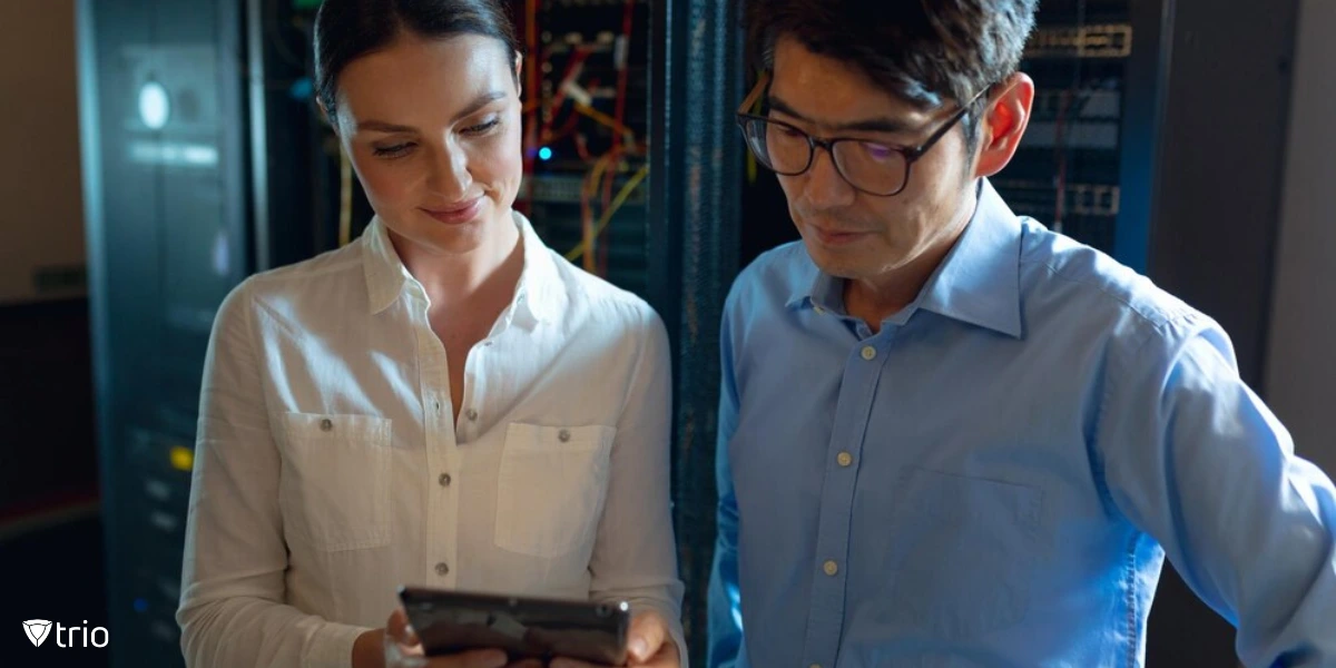 male and female engineers using digital tablet