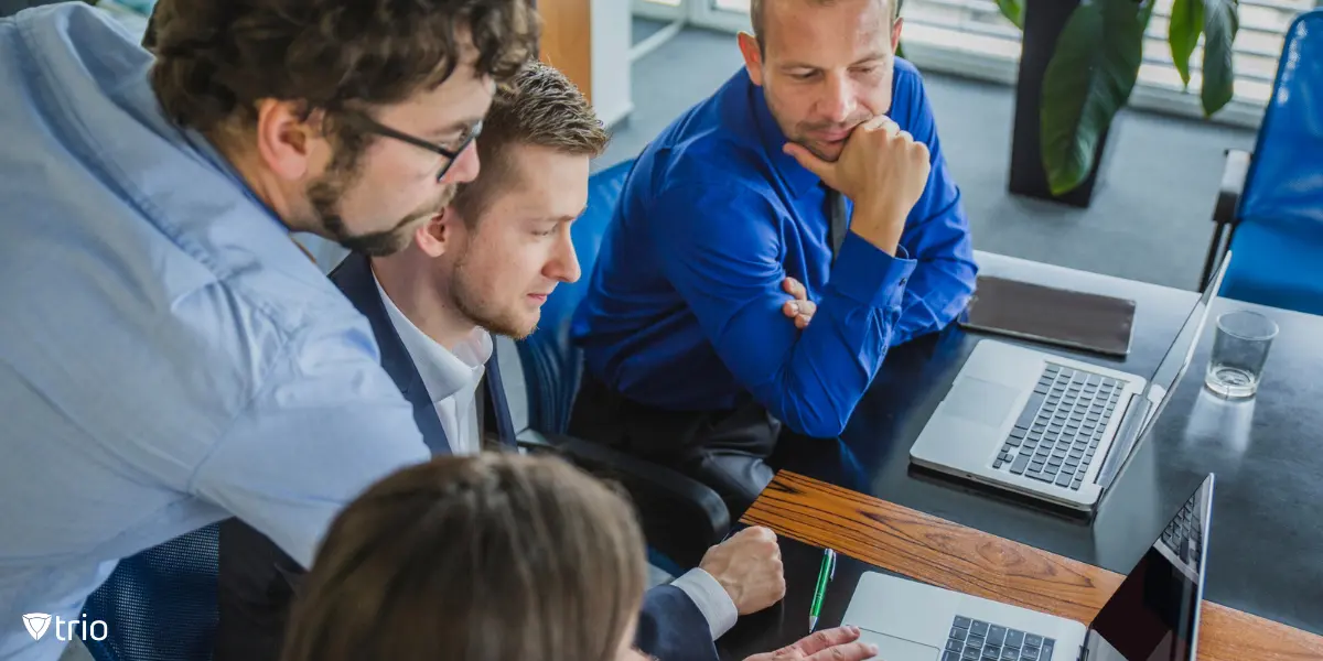 Several IT admins working together to fix a Kernel Panic Mac issue