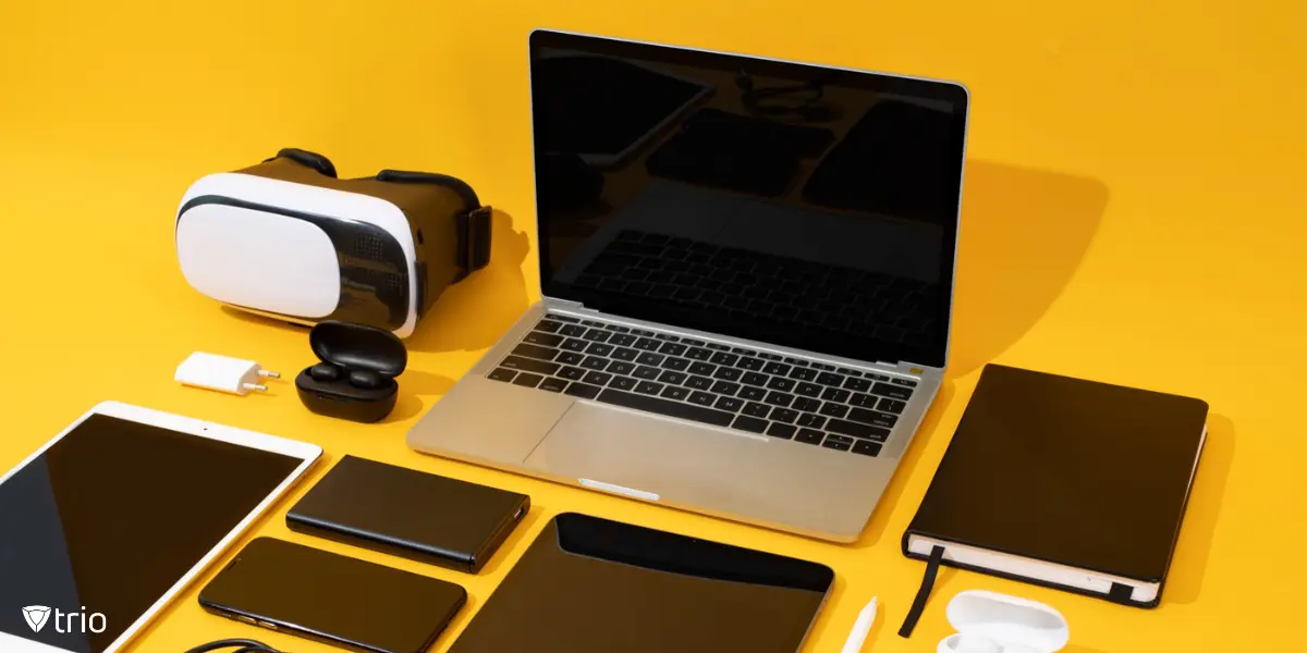 A collection of digital and mobile devices on a yellow background.