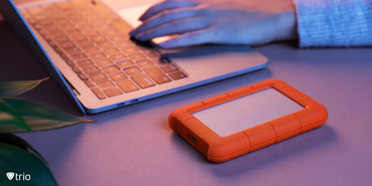 IT administrator preparing UEM migration with infrastructure assessment and planning documents