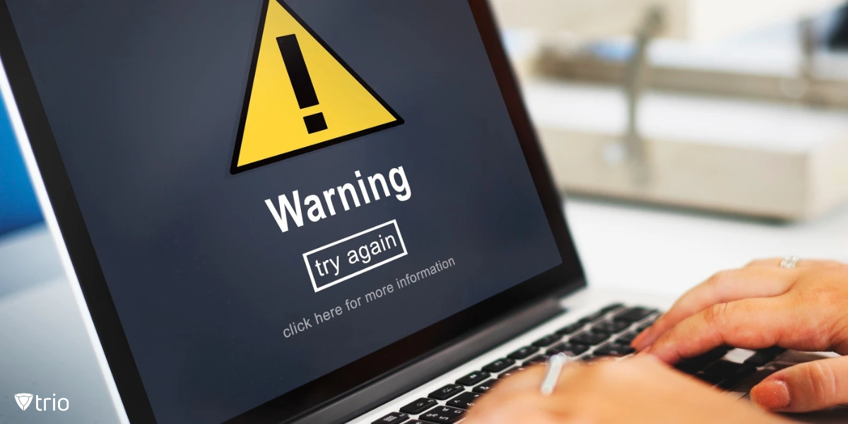 laptop with warning signal on it